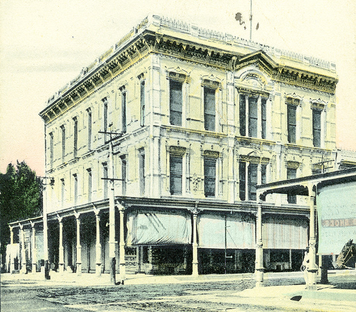 This photo of the IOOF/Lee Pharmacy building was taken before the street was paved. Note that the trim on the building has been removed. During the 1940's and 50's many facades on downtown buildings were “modernized.”